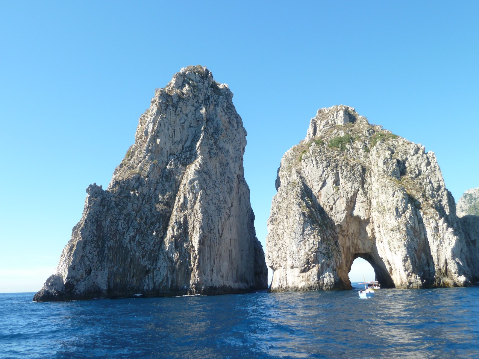 The Faraglioni sea stacks of Capri at golden hour